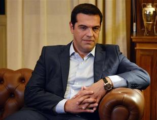 Greeces Tsipras resigns, calls snap polls to beat party revolt