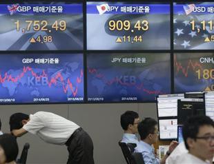 Sinking currencies point to jitters about emerging economies