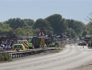 Seven killed at British airshow as jet crashes into road
