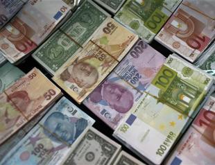 Emerging economies let currencies slide to stay competitive