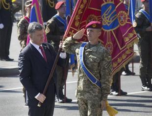 Ukraine leader accuses Russia of arms supplies to rebel east