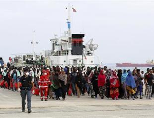 Italy hits back at Merkel in migrants row