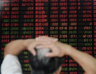 Chinese journalist confesses to market chaos: State media