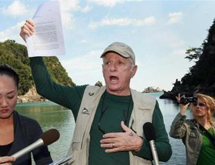 Japan arrests Flipper trainer as dolphin hunt starts