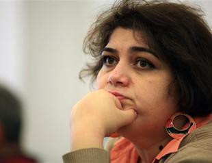 Azerbaijan jails top journalist for seven and a half years