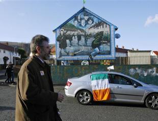 British PM calls for more talks to cool Northern Irish crisis