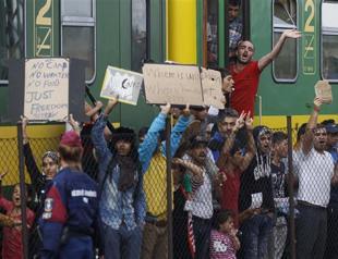 EU under pressure to agree binding refugee quotas as ministers meet