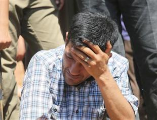 Drowned Syrian boy buried in war-torn Kobane