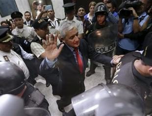 Guatemalas president quits, jailed pending hearing on corruption charges