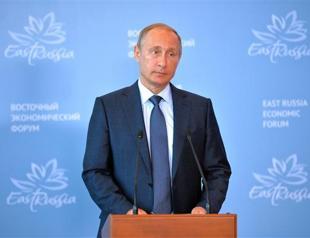 Putin says Assad agrees to early parliamentary polls