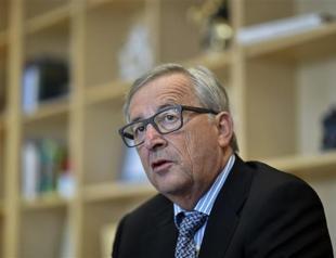 Juncker says EU to aid refugees, tighten border controls