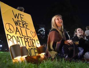 Australia boosts refugee intake, extends air strikes to Syria