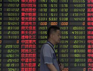 Beijing admits stock bubbles, says routs almost over