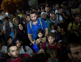 Fresh clashes on Lesbos as Britain, France pledge to take migrants