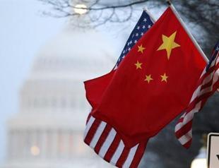 China will work with U.S. on hacking, defend its interests: official