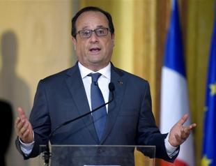 Hollande says will ask EU summit to work with Turkey on refugee crisis