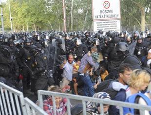 EU members that dont help with refugees wont get money: Germany