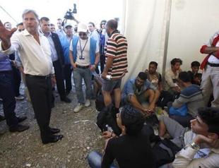 EU official sees aid to keep migrants in Turkey