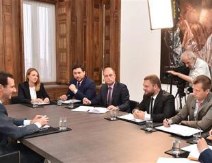 Merkel says Assad must be involved in Syria talks