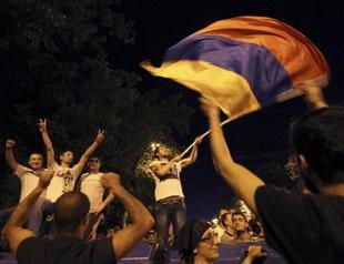 ‘Electric Yerevan’ protesters dig in as tensions flare in Armenia