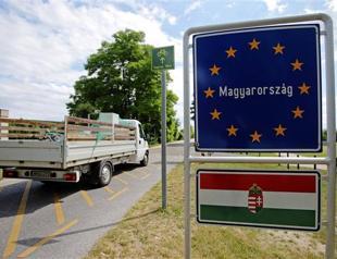 Austria warns Hungary it may retaliate in row over migrants