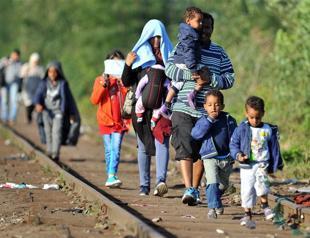 Refugees seek new routes as Hungary seals border