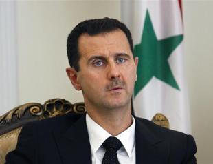 Assad says only Syrian people can decide if he quits