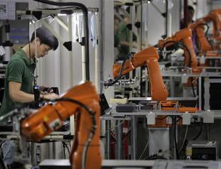 China flash factory PMI unexpectedly falls to 6.5-year-low