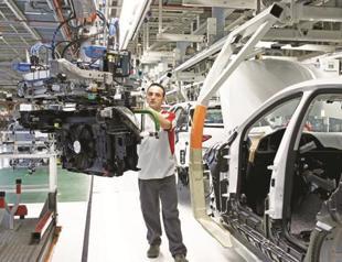 VW seeks to boost finances to meet emission scandal costs