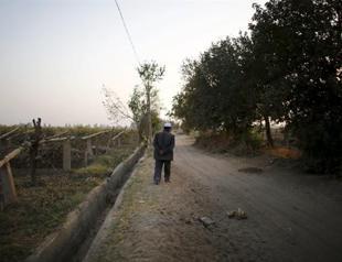In Uighur heartland, China vows heavy pressure to defeat militants