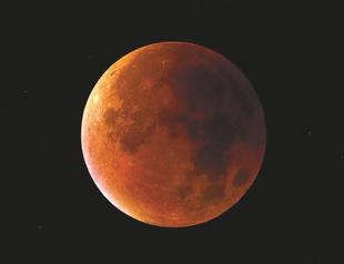 ‘Super blood moon’ shines bright across the world