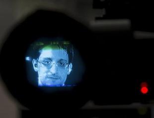 Snowden joins Twitter, follows NSA
