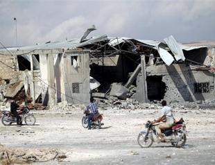 Syrian army and Russian jets target rebels in western Syria