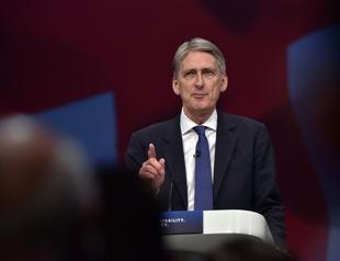 Russia is conducting asymmetric warfare in Syria: Britains Hammond