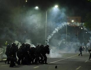 Tear gas and stone-throwing as police question Kosovo MP