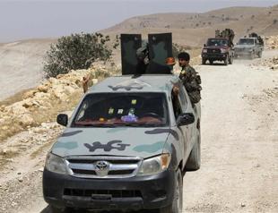 US drops ammo to anti-ISIL rebels as Syria regime advances