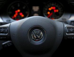 VW to cut investment in core brand to cope with scandal