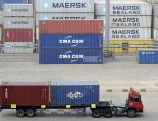 China economic picture remains cloudy as Sept export fall eases, imports slump