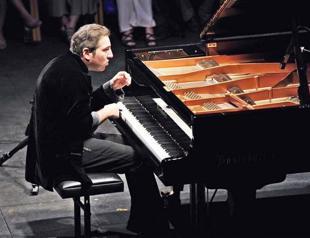 Top appeals court reverses blasphemy decision against Turkish pianist Say