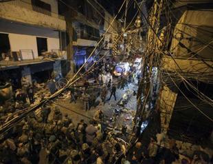 Lebanon in mourning after bomb blasts kill 43