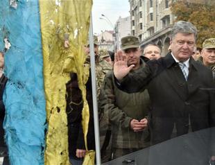 Poroshenko faces judgement day as Ukraine votes without rebel east