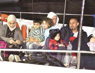 Turkish and Greek Cypriot coast guards save refugees