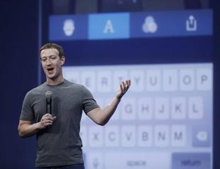 Facebook rides mobile wave to boost profits, user base
