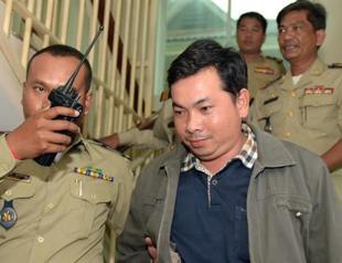 Cambodian charges 3 suspects after mob attack on opposition lawmakers