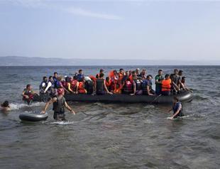 Two more child migrants drown off Greece amid angry protests