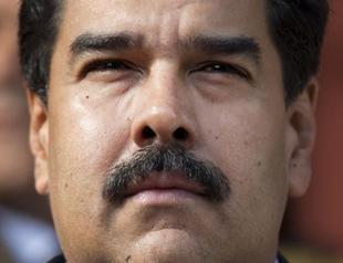 Venezuelan president to ax moustache if he misses housing target