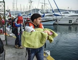 At least eight migrants drown off Greece after boat capsizes