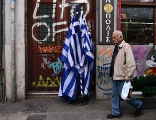 Greece reaches deal with lenders over reforms unlocking stalled aid: Minister