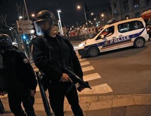 Two killed in Paris in raid on attack suspect