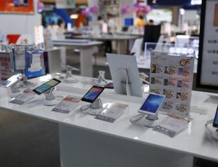 Turkish economy minister backtracks on phone tax comments